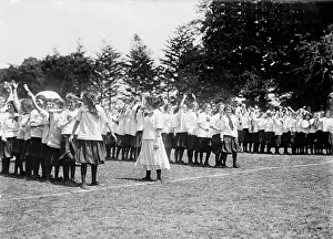 Schoolgirls Prints: Pass ball relay, Pelham Bay Park, 1911. Creator: Bain News Service