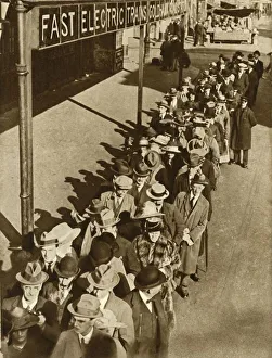 Train Station Prints: Passengers waiting at Goldhawk Road Station in London during the railway strike