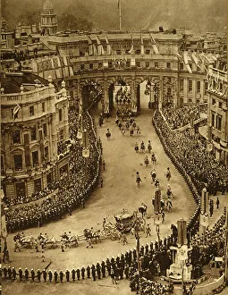 Queen Consort Elizabeth Prints: Passing Through the Admiralty Arch, 1937. Creator: Photochrom Co Ltd of London