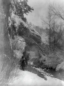 Passing the cliff-Apsaroke, c1908. Creator: Edward Sheriff Curtis