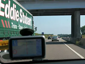 Satellite Navigation Prints: Passing Eddie Stobart truck on the A46 with satnav screen on windscreen