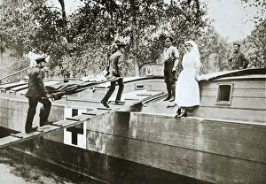 Stretcher Bearer Collection: Patients being taken on board a hospital barge, Somme campaign, France, World War I, 1916