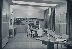 Bookshelves Gallery: Paul Bromberg. Combined drawing- and dining-room in a house at Rotterdam, in ivory