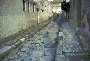 Paved Prints: Paved street in the Roman town of Herculaneum, 1st century