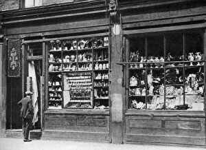 A pawnbrokers shop front, Bow, London, 1926-1927.Artist: Whiffin