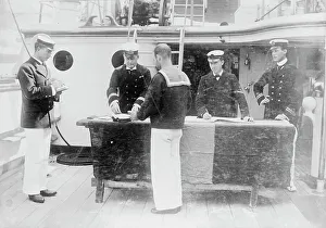 Pay Day Prints: Paying sailors, British Navy, between c1910 and c1915. Creator: Bain News Service