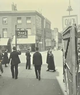 Tram Stop Prints: Pedestrians and tram sign outside Waterloo Station, Lambeth, London, 1929