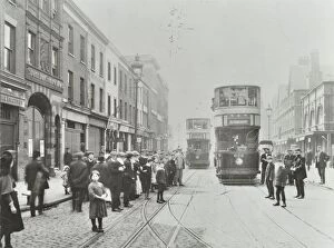 Cobblestone Gallery: Pedestrians and trams in Commercial Street, Stepney, London, 1907