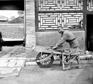 Street Vendor Prints: Peking, Pechili province, China: a knife-grinder, 1869. Creator: John Thomson