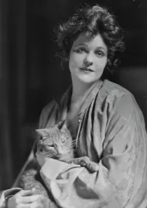 Dishevelled Prints: Pell, Miss, with Buzzer the cat, portrait photograph, 1916 Apr. 11. Creator: Arnold Genthe