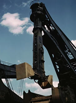 Pennsylvania R.R. ore docks, a 'Hulett' unloader in operation, Cleveland, Ohio, 1943. Creator: Jack Delano
