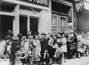 People queuing outside a dairy shop, German-occupied Paris, 26 July 1940 People queuing outside a dairy shop, German-occupied Paris, 26 July 1940