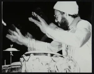 Woolly Hat Prints: Percussionist Guilherme Franco playing at the Newport Jazz Festival, Middlesbrough, 1978
