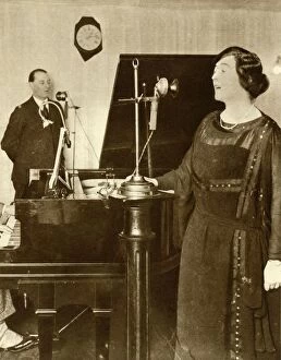 Performers singing a duet in one of the studios of 2LO, Savoy Hill, London, 1923, (1935)