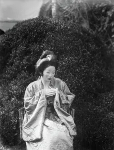 Geisha Prints: Person wearing a mask made by W.T. Benda, 1925 Sept. 20. Creator: Arnold Genthe