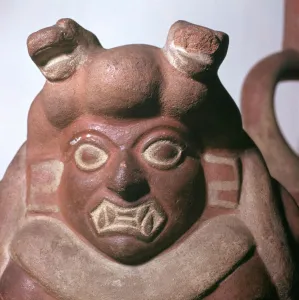 Peruvian earthenware bottle in the form of a squatting figure, 5th century Peruvian earthenware bottle in the form of a squatting figure, 5th century