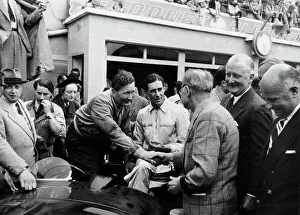 Sarthe Prints: Peter Whitehead being congratulated on his victory with Peter Walker of the Le Mans 24 hours