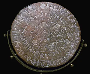 Phaestos Disc, from Minoan Royal Palace at Phaestos, 20th century BC Phaestos Disc, from Minoan Royal Palace at Phaestos, 20th century BC