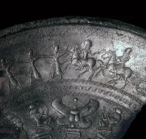 Phoenician Gallery: Detail of a Phoenician silver bowl showing soldiers attacking a city, 7th century BC