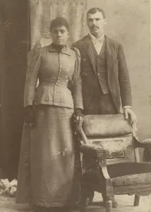 Photograph of an African-American couple standing behind a chair, ca. 1890 Photograph of an African-American couple standing behind a chair, ca. 1890