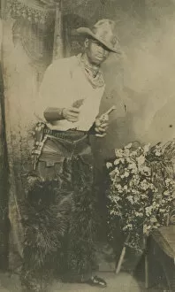 Cowboy Hat Gallery: Photograph portrait of a man dressed as a cowboy, early 20th century. Creator: Unknown