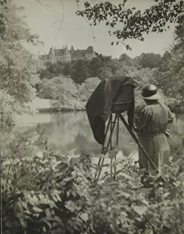 Gilded Age Prints: Photographer Frances Benjamin Johnston standing beside her large view camera looking