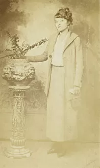 Plant Pot Gallery: Photographic postcard of a woman, 1918-1930. Creator: The Rex Photo Studio