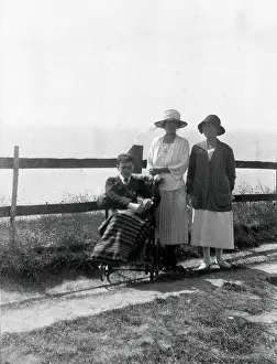 Disability Prints: A physically disabled boy sitting in a wheelchair, c1910/1925. Creator: Unknown