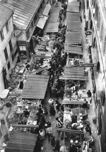 Flammarion Prints: The picturesque market in Passage Berryer, Paris, 1931. Artist: Ernest Flammarion