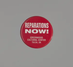 Riots Prints: Pinback button promoting reparations for the Tulsa Race Massacre, ca. 2001