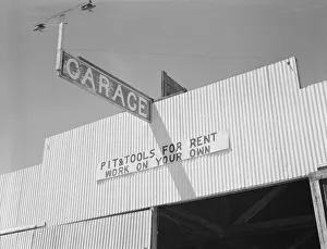 Pit and tools for rent--work on your own, U. S. 99, Fresno County, California, 1939. Creator: Dorothea Lange