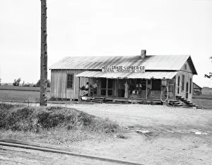 Filling Station Prints: Plantation store, Mississippi Delta, 1936. Creator: Dorothea Lange