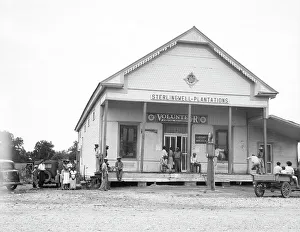 Filling Station Prints: A plantation store near Clarksville, Mississippi, 1936. Creator: Dorothea Lange