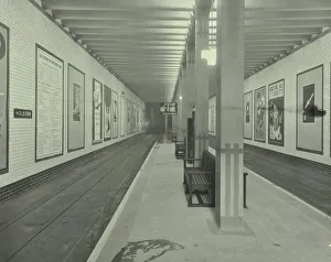 Tube Station Prints: Platform with advertising posters, Holborn Underground Tram Station, London, 1931