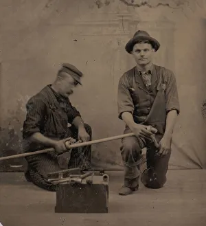 Workman Prints: Two Plumbers with a Pipe, Pipe Cutter, and Toolbox, 1870s-80s. Creator: Unknown
