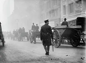 Workers Rights Prints: Police protecting garbage carts, 1911. Creator: Bain News Service