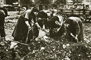 Starving Collection: The poor of Berlin rummaging in refuse heaps, Germany, c1914-c1918