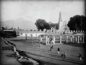 Transparency Prints: Popocatepetl from the plaza, Amecameca, between 1880 and 1897. Creator: William H. Jackson