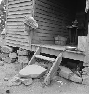 Steps Collection: Porch leading to kitchen of sharecropper cabin, Person County, North Carolina, 1939