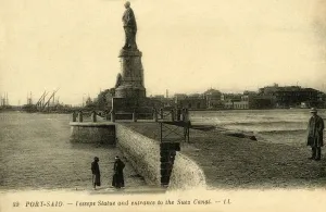 Port Said. - Lesseps Statue and entrance to the Suez Canal - LL., c1918-c1939. Creator: Unknown Port Said. - Lesseps Statue and entrance to the Suez Canal - LL., c1918-c1939. Creator: Unknown