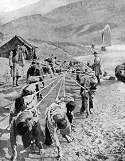 Peoples Of The World In Pictures Gallery: Porters in Tibet, 1936. Artist: Fox