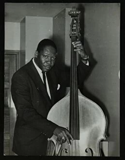 Portrait of American double bass player Curtis Counce, c1950s. Artist: Denis Williams