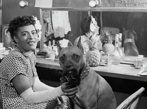 Portrait of Billie Holiday and Mister, Downbeat(?), New York, N.Y. ca. June 1946. Creator: William Paul Gottlieb