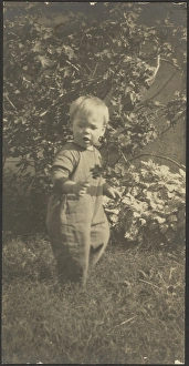 Toddler Prints: Portrait of a Child in Garden, 1907-1924. Creator: Louis Fleckenstein