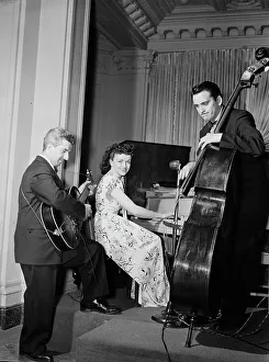 Portrait of Dardanelle, Joe Sinacore, and Bert Nazer, Sheraton Hotel, Satire Room(?), N.Y. 1946. Creator: William Paul Gottlieb