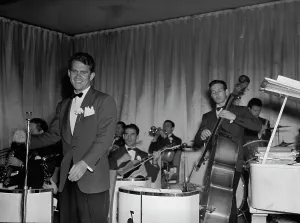 Dinner Jacket Prints: Portrait of Dean Hudson, ca. Aug. 1946. Creator: William Paul Gottlieb