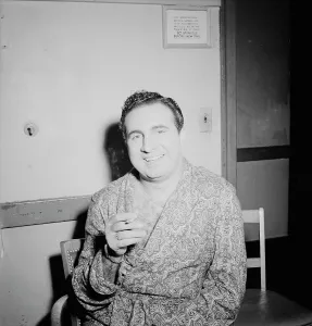 Dressing Gown Prints: Portrait of Dick Stabile, New York, N.Y.(?), ca. Aug. 1946. Creator: William Paul Gottlieb