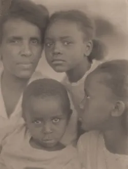 Tenderness Gallery: Portrait of a Family, 1922. Creator: Edith R Wilson