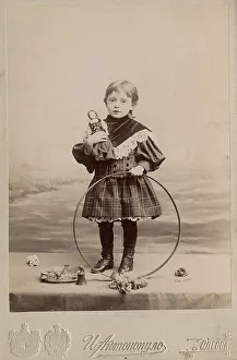 Hoop Prints: Portrait of a girl with a hoop and a doll, 1900. Creator: I. Antonopulo