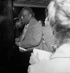Portrait of James P. (James Price) Johnson, Riverboat on the Hudson, N.Y. ca. July 1947. Creator: William Paul Gottlieb